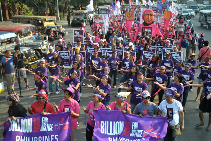 Thousands march and dance from Quezon City Memorial Circle to UP Diliman for the One Billion Rising for Justice on Feb. 14. Macky Macaspac 